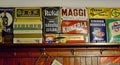 Retro tin signs in restaurant, Cesky Krumlov, Czech Republic