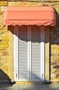 Cesme Alacati located in old antique house pink white wooden windows and shutters, Turkey Izmir Royalty Free Stock Photo