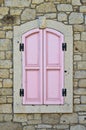 Cesme Alacati located in old antique house pink wooden windows and shutters, Turkey Izmir Royalty Free Stock Photo