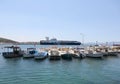 Fishing Boats and A Ferry docked at Cesme Port in Cesme, Turkey Royalty Free Stock Photo