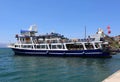 Tour Boat waiting for customers at Cesme Port Royalty Free Stock Photo