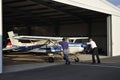 Cessna 152 Pushed Back into the Hanger Royalty Free Stock Photo