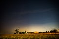 Cestlice, Czech republic - July 22, 2020. Building of shooting range in the field at night with comet C/2020 F3 Neowise above