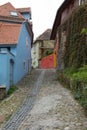 The Cetatii street is leading to the entrance to the old town in Sighisoara city in Romania Royalty Free Stock Photo