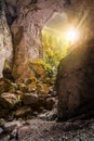 Cetatile cave sculpted by river in romanian mountains at sunset