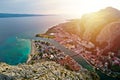 Cetina river mouth and town of Omis aerial sunset view