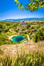 Cetina river source water hole and Orthodox church view Royalty Free Stock Photo