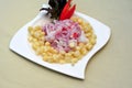 Ceviche, a dish of raw fish, and accompanied by corn from the cuisine of Peru Royalty Free Stock Photo