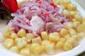 Ceviche, a dish of raw fish,and accompanied by corn from the cuisine of Peru Royalty Free Stock Photo