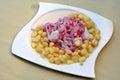 Ceviche, a dish of raw fish, cooked and accompanied by corn from the cuisine of Peru Royalty Free Stock Photo