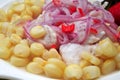Ceviche, a dish of raw fish, cooked and accompanied by corn from the cuisine of Peru Royalty Free Stock Photo