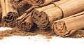 Ceylon cinnamon sticks and cinnamon powder on white background, close up Royalty Free Stock Photo