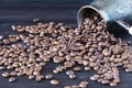 Cezve with freshly roasted coffee beans on sackcloth Royalty Free Stock Photo