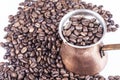 Cezve, ibrik and coffee beans Royalty Free Stock Photo