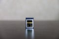 CFexpress memory card on dark table. Royalty Free Stock Photo