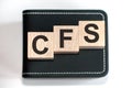 Cfs - acronym from wooden blocks with letters, concept Royalty Free Stock Photo
