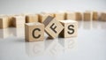 CFS word made from wooden cubes on gray background Royalty Free Stock Photo
