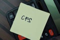 CFS write on sticky notes isolated on Wooden Table Royalty Free Stock Photo