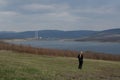 Chabarovice, Czechia - April 09, 2023: view to lake of Milada at spring sunset and autoportrait