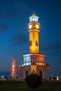 Chacha Clock Tower And Ferris Wheel Evening Illumination Lights In Seafront Promenade, Batumi.