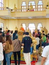 Many people pray respect Golden Buddha statue inside