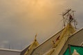 Chachoengsao, Thailand - May 12, 2017: Unidenitified workers during repair roof of the church in Wat Sothonwararam, a famous