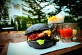 Chacoal burger and french fries.