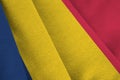 Chad flag with big folds waving close up under the studio light indoors. The official symbols and colors in banner Royalty Free Stock Photo