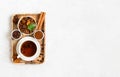 Chaga mushroom drink, coffee beans, chaga pieces, anise and cinnamon in a wooden tray. Chaga mushroom coffee on a white background Royalty Free Stock Photo