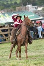 Chagra cowboy working the lasso at rodeo in Ecuador