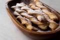 Chai Spiced Russian Twig Sweet Crackers with Powdered Sugar in Wooden Bowl. Royalty Free Stock Photo