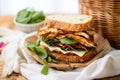 chai tea spiced chicken sandwich in a wicker basket