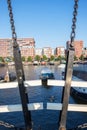 Chain Bridge on the background of Westerdok Amsterdam Netherlands Dutch modern city