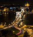 The Chain Bridge in Budapest at night with St. Stephen`s Church Royalty Free Stock Photo