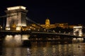 The Chain Bridge in front of the Gresham Palace in Budapest Royalty Free Stock Photo