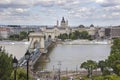 Chain Bridge over the Danube River in Budapest with St Stephen Basilica behind Royalty Free Stock Photo