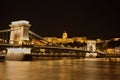 Chain Bridge, Royal Palace and Danube river in Budapest at night Royalty Free Stock Photo