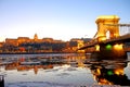 The Chain Bridge and the Royal Palace at sunset over the icy Dan Royalty Free Stock Photo