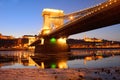 The Chain Bridge at sunset over the icy Danube River, Budapest, Royalty Free Stock Photo