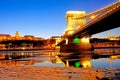 The Chain Bridge at sunset over the icy Danube River, Budapest, Royalty Free Stock Photo