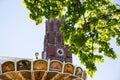 Chain carousel in front of Mariahilfkirche