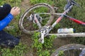 Biker changing his broken bike chain Royalty Free Stock Photo