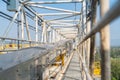 Chain conveyor raw materials across production buildings.