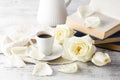 Chain drinking hot coffee on a wooden floor with beautiful roses Royalty Free Stock Photo