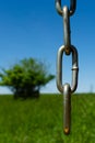 Chain with field in background Royalty Free Stock Photo