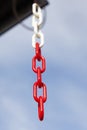 Chain hanging from the roof to divert rainwater Royalty Free Stock Photo