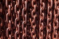 Chain heap wall. Abstract metallic brown chains background Royalty Free Stock Photo