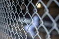 a chain link fence at a baseball dugout field Royalty Free Stock Photo