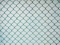 Chain Link Fence with cement wall Background Royalty Free Stock Photo