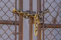 Chain link fence closed with padlock and chain Royalty Free Stock Photo